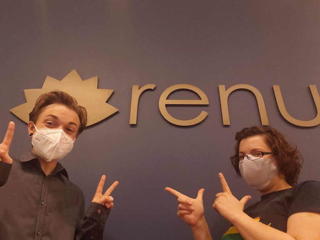 Cy-and-Amanda-fun-pic-at-Renu-front-desk-masked