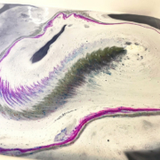 Visible Asexual Ghost bath bomb colors in bath tub