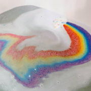 Cloud bath bomb fizzing a rainbow in bath water